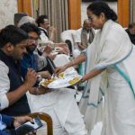 Mamata banerjee serving food