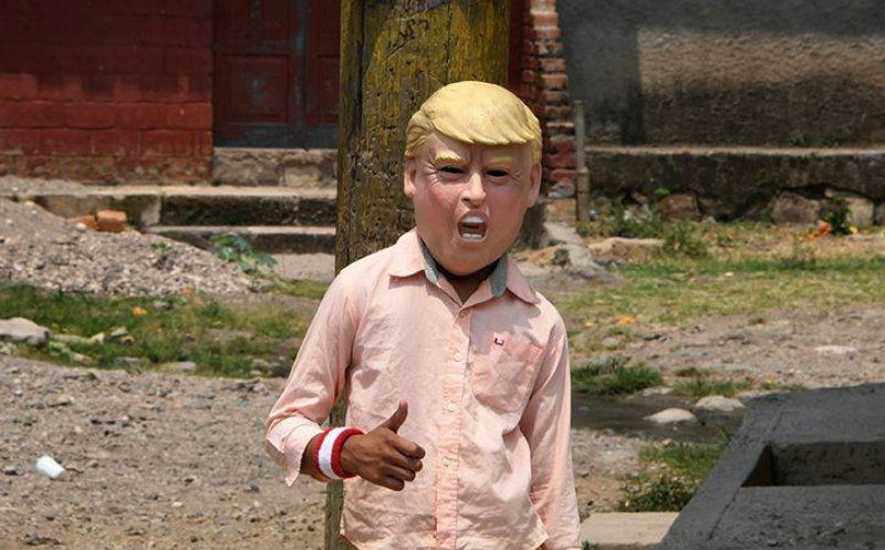 man wearing donaldtrump masks