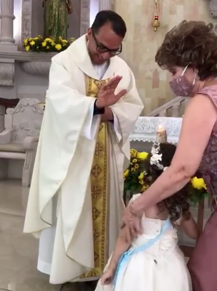 girl high five priest 2