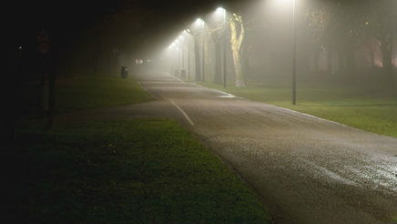 man walking alone night
