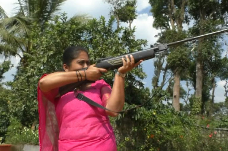 Mirror Gun Shoot Kodagu woman 1
