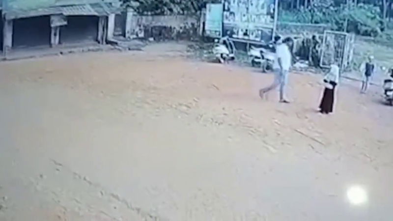 Man lifts throws Girl 1
