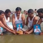fans took a holy dip holding a photo of shivaganga basavaraj at the mahakumbh mela