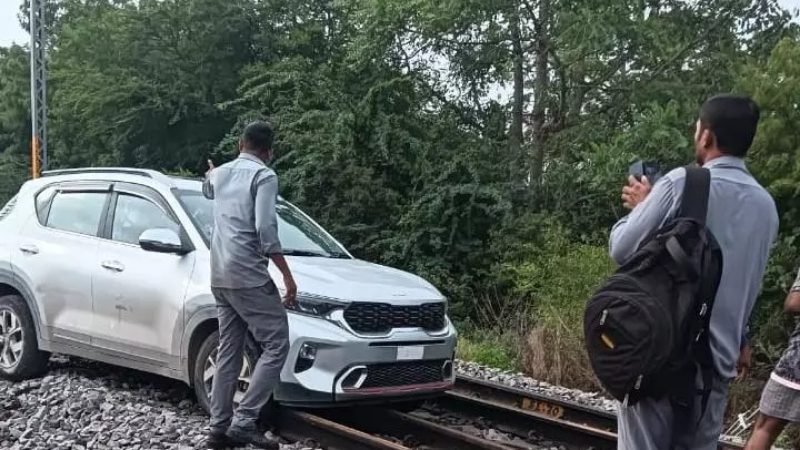 Woman Drives Car On Railway Tracks 1