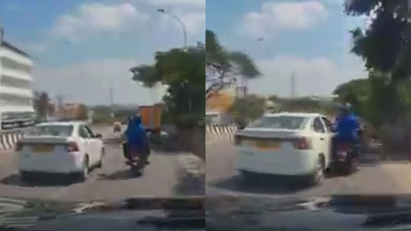 Cab driver attacks biker in Kr Pura Bengaluru video captured